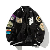 Blouson jacket baseball homme noir avec écussons brodés colorés, quilting intérieur et style varsity classique