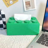 Boîte à mouchoirs verte en plastique style lego avec six plots circulaires pour mouchoirs lego