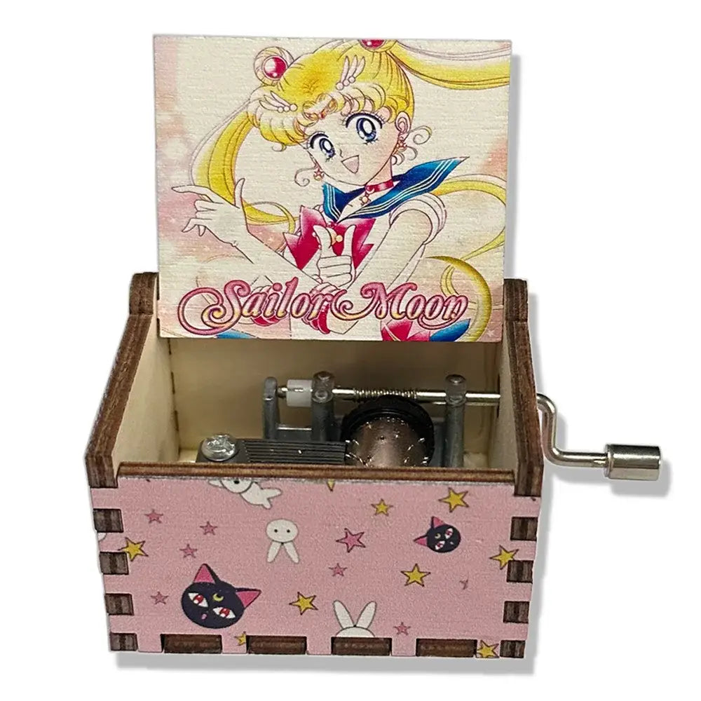 Boîte à musique sailor moon en bois rose avec artwork sailor moon moonlight densetsu et motifs chat lapin étoile