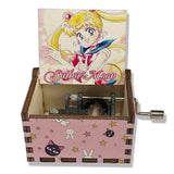 Boîte à musique sailor moon en bois rose avec artwork sailor moon moonlight densetsu et motifs chat lapin étoile