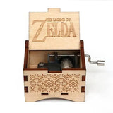 Boîte à musique legend of zelda en bois clair avec motifs gravés au laser et manivelle pour mélodie d’hyrule