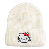 Bonnet hello kitty hiver en velours côtelé crème avec visage brodé hello kitty et noeud rouge idéal pour déguisement carnaval