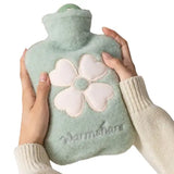 Hot water bottle with plush cover