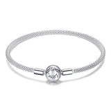 Bracelet argent amour en mailles argent avec un pendentif rond gravé forever love