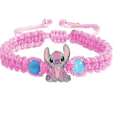 Bracelet disney stitch en macramé rose avec un charme émaillé stitch rose et deux perles bleu clair