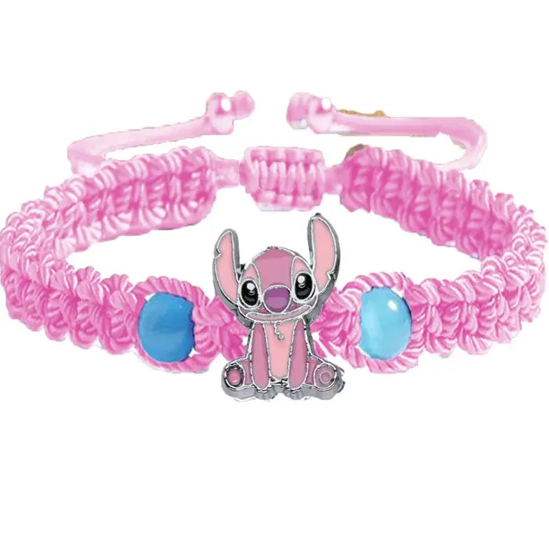 Bracelet disney stitch en macramé rose avec un charme émaillé stitch rose et deux perles bleu clair