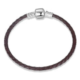 Bracelet tressé femme en cuir marron avec fermoir argenté offrant un bijou élégant et confort optimal