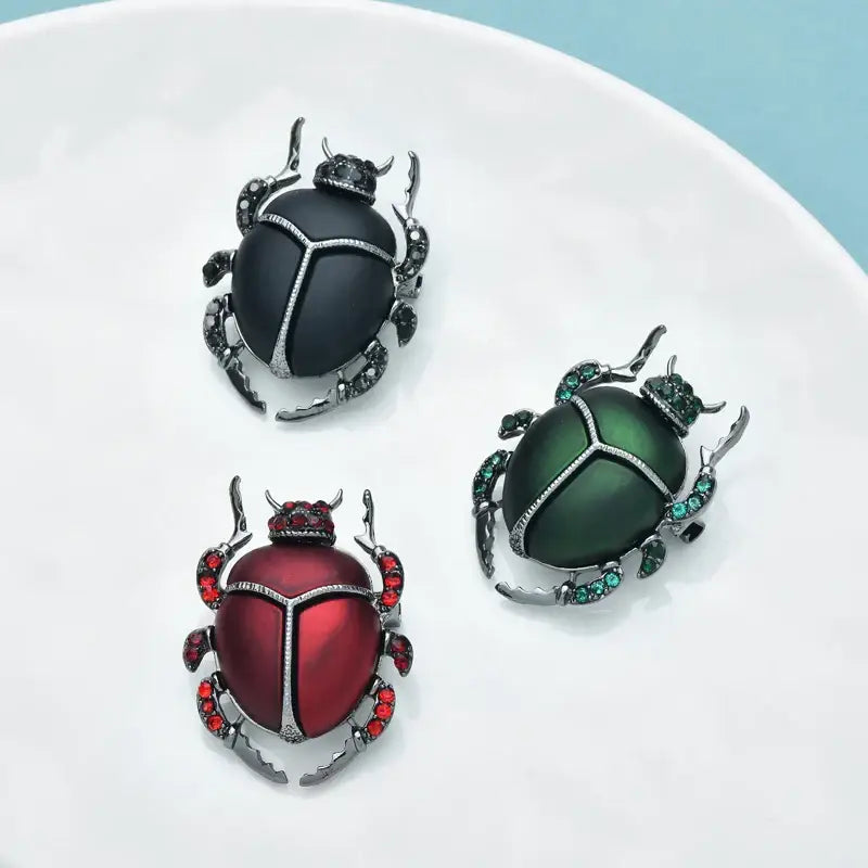 Elegant blue scarab brooch