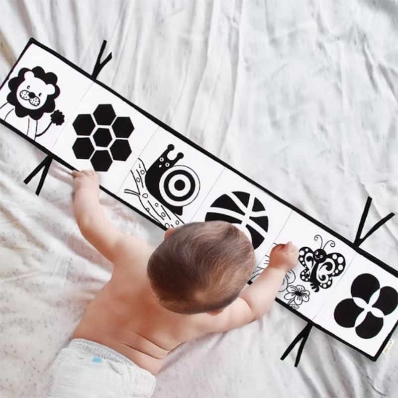 Busy Board Bébé : Le Livre d'Éveil en Tissu