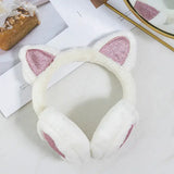 Cache oreilles fillette fourrure blanc avec oreilles en peluche et accents paillettes roses sur les coussinets intérieurs