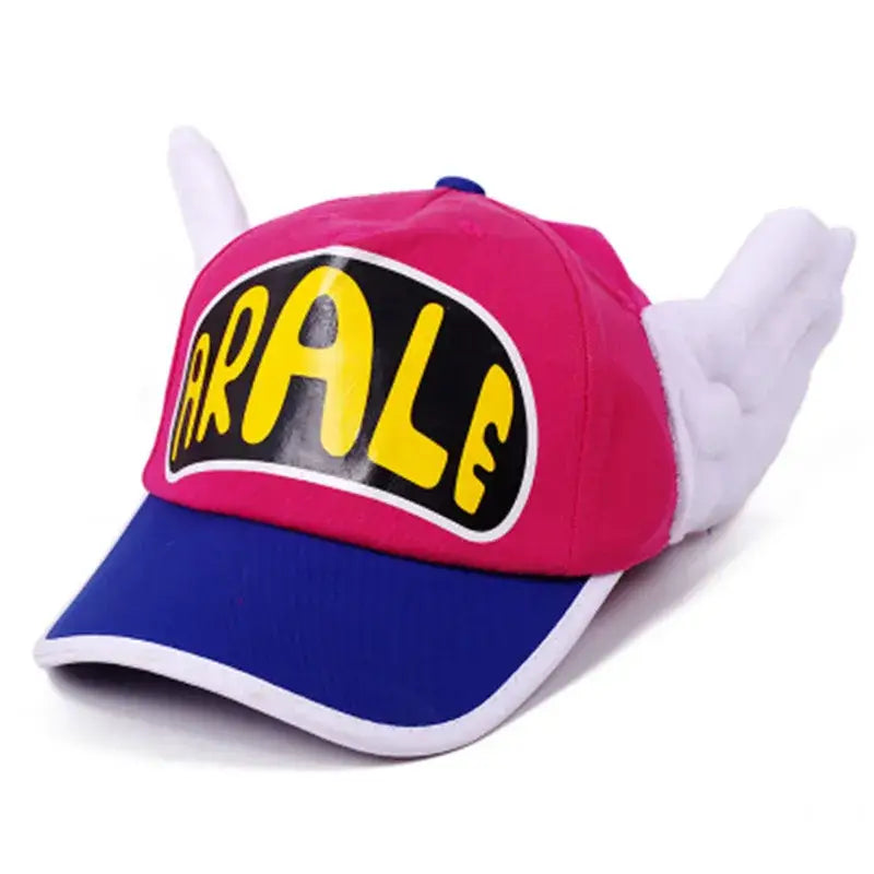 Casquette coton enfant animé anime dr slump rose et bleue avec ailes blanches en peluche et logo arale jaune et noir