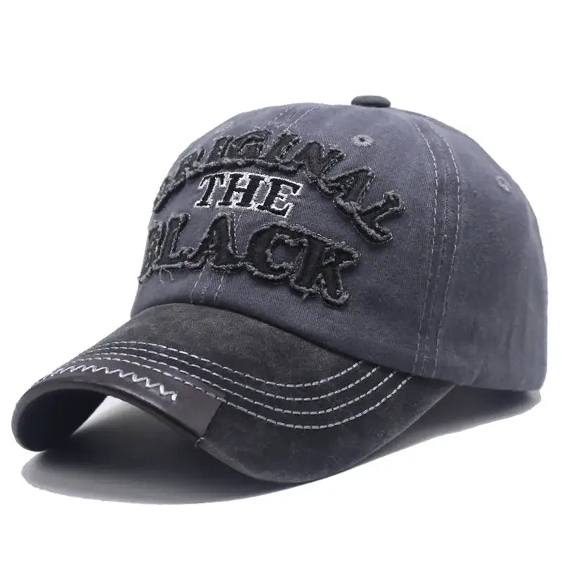 Casquette mode original unisexe en tissu durable gris foncé avec lettre original the black brodée et coutures blanches