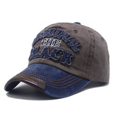 Casquette mode original unisexe en tissu durable marron avec logo brodé navy et visière en daim