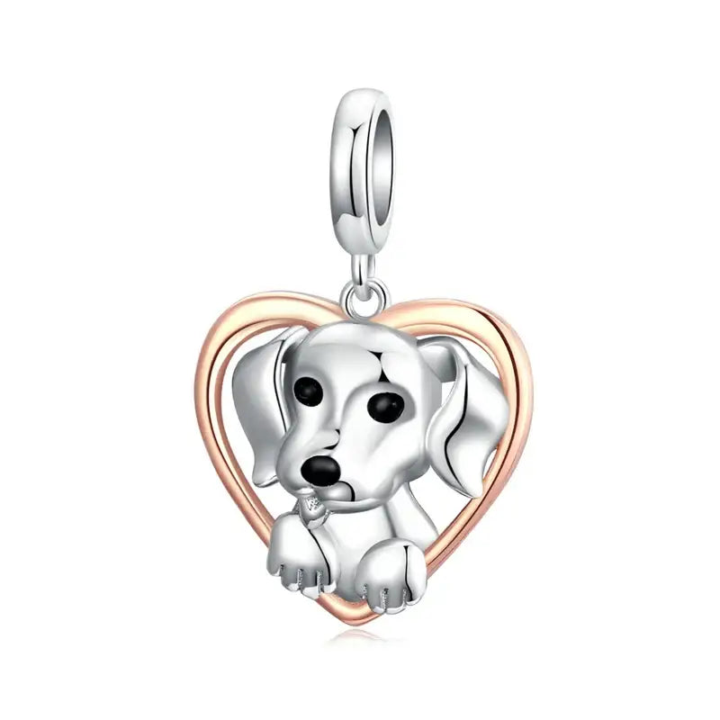 Charm chien argent en forme de cœur en argent et or rose avec un chiot détaillé pour bracelet chiens argent et touche d’élégance