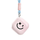 Chauffe-mains rechargeable rose en forme de losange avec visage souriant noir et cordon bleu pour mains chaudes hiver doux restez