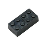 Clé usb en forme de lego noir en plastique 2x4 jointes disponible dans magasins de jouets pour déguisement carnaval