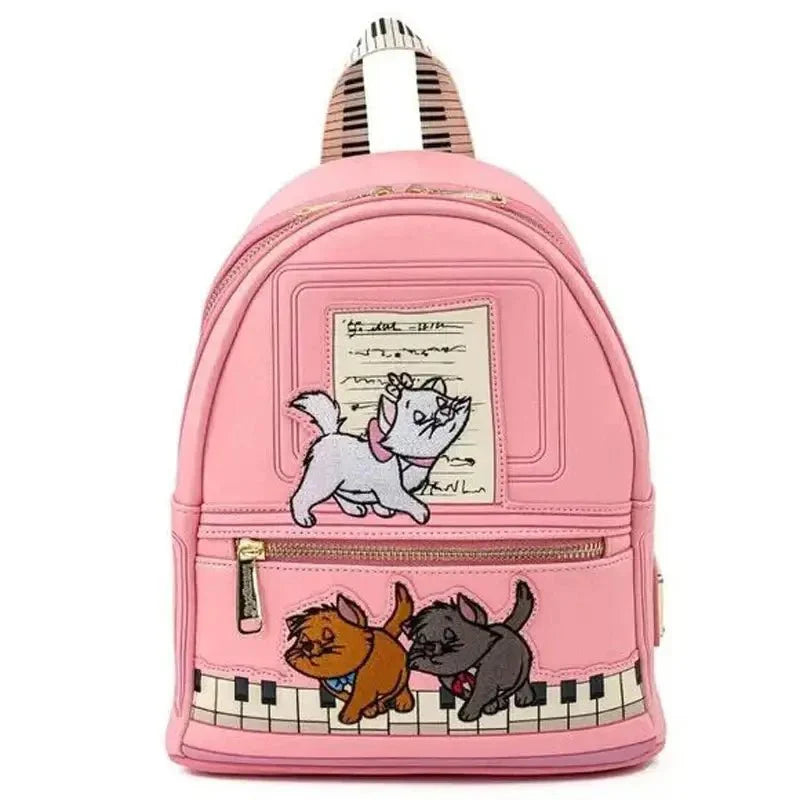 Mini sac à dos rose en cuir disney avec broderies aristocats sur clavier de piano collection sacs cuir disney peter pan
