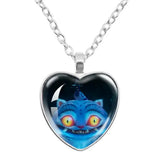 Collier k-pop demon hunter pendentif coeur avec chat bleu vibrant aux yeux jaunes lumineux et oiseau sous verre argenté