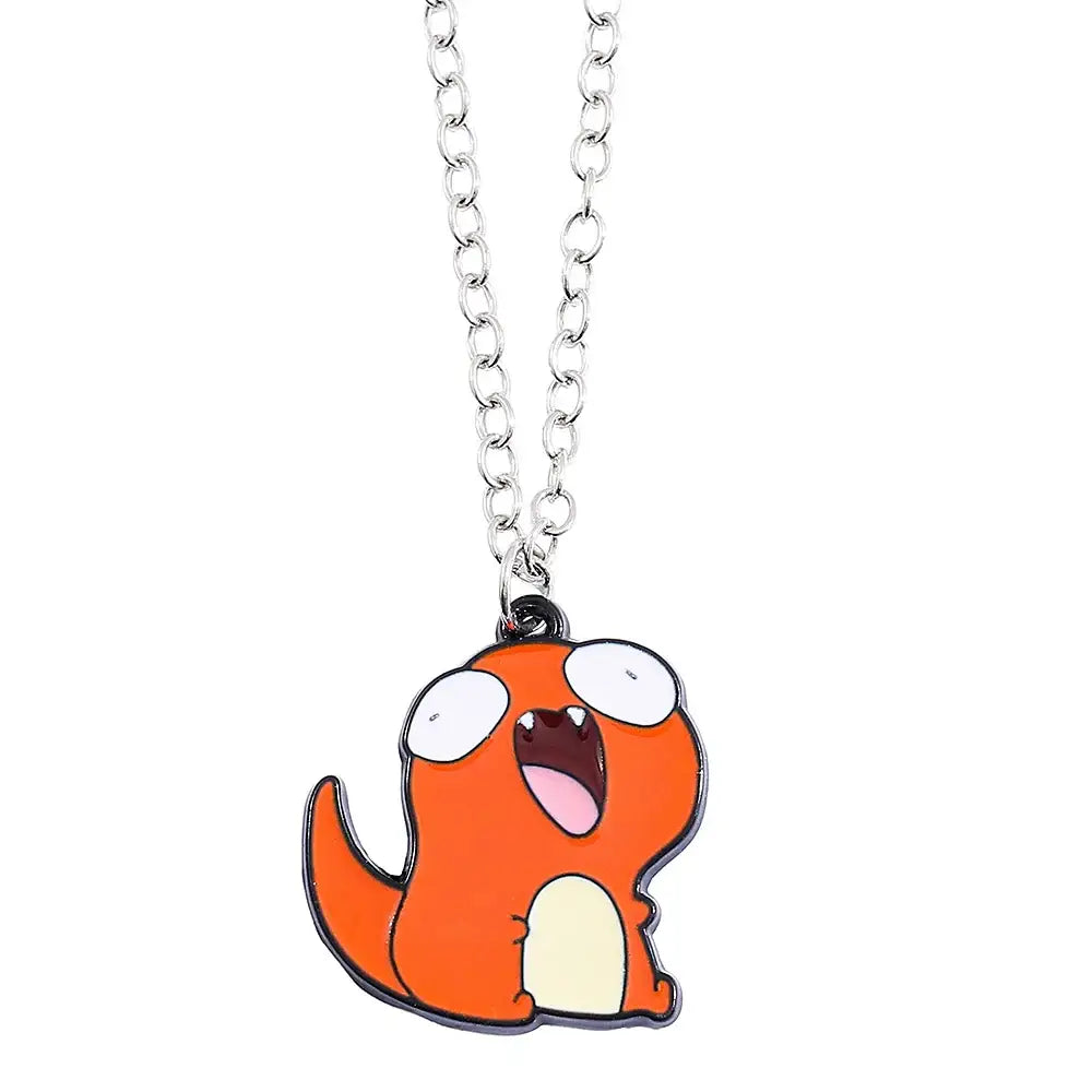 Collier pendentif pokémon en émail orange avec créature caricaturale aux grands yeux et langue rose visible