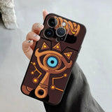 Coque iPhone en brun foncé avec design orange et bleu de masque Majora The Legend of Zelda pour protection téléphone Zelda