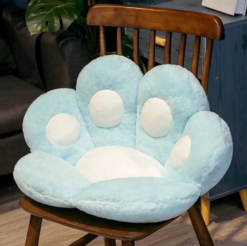 Coussin de siège en peluche patte d’ours bleu clair avec accents blancs circulaires sur chaque patte