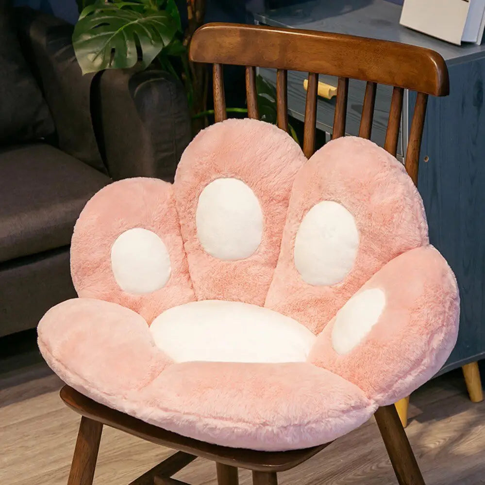Coussin de siège en peluche patte d’ours rose avec accents blancs circulaires sur chaque patte