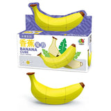 Cube magique puzzle forme fruits banane jaune avec bouts marron et pièces plastiques segmentées