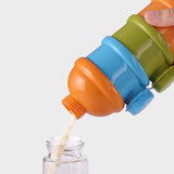 Boite doseuse poudre de lait multicolore pour bébé
