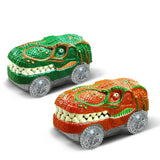 Ensemble circuit voiture électrique dinosaure avec voitures verte et orange à écailles détaillées roues plastique transparentes