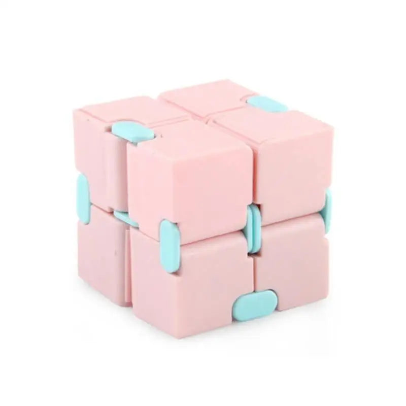 Cube magique puzzle en silicone rose et bleu clair avec sections carrées emboîtables pour puzzle anti stress fidget cube magique