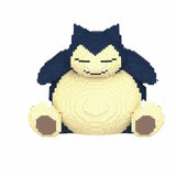 Figurine 3d pokémon de snorlax en briques plastique crème et bleu marine pour l’univers pokémon et déguisement carnaval