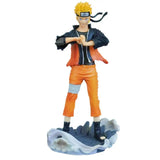 Figurine naruto uzumaki orange et noir avec cheveux blonds en piques tenue signature orange et veste sombre
