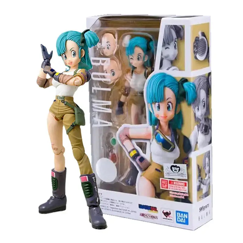Figurine dragon ball bulma goku avec cheveux bleus, top blanc et pantalon beige, bras croisés sur la poitrine