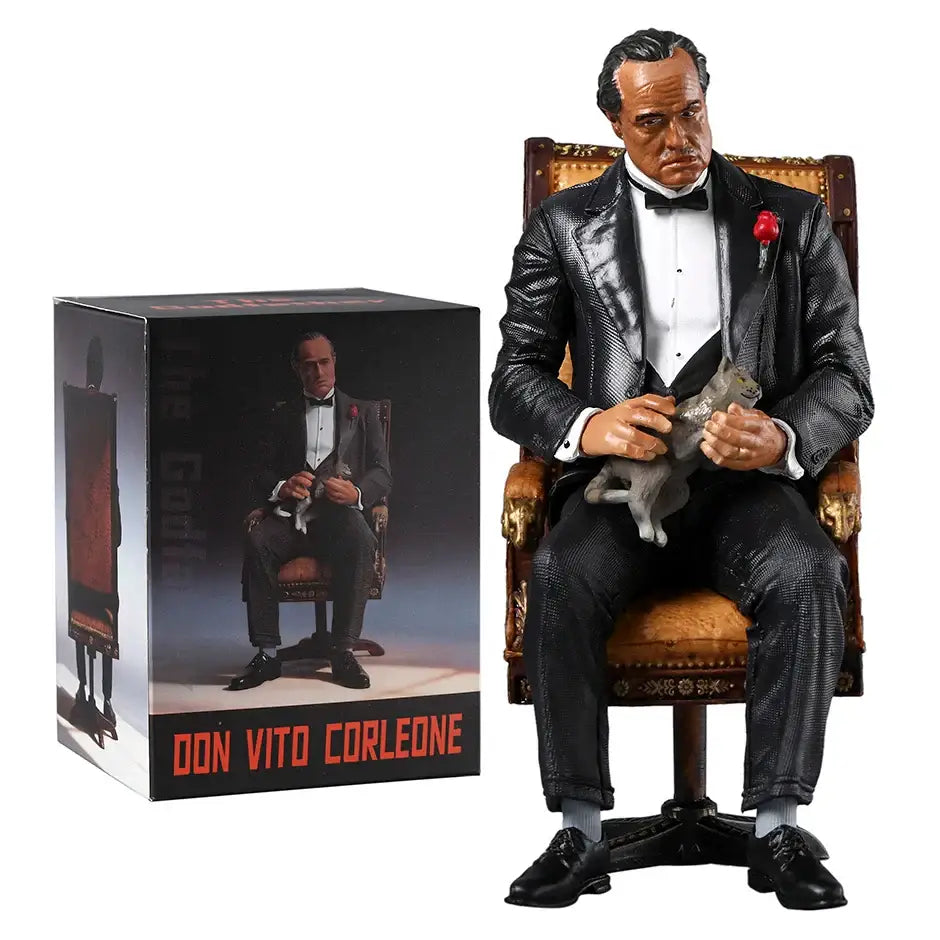 Figurine le parrain vito corleone en costume tuxedo noir texturé assis sur chaise ornée tenant chat gris