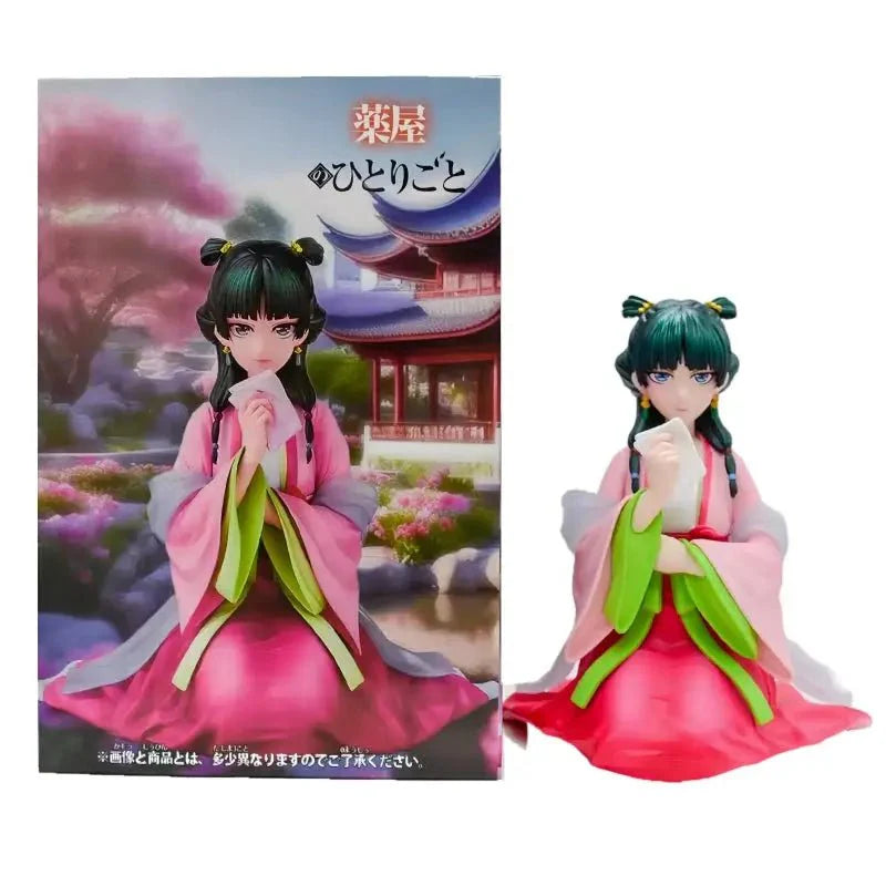 Figurine manga japon maomao en robe traditionnelle rose et verte avec coiffure en double chignon noir représentant la culture japonaise