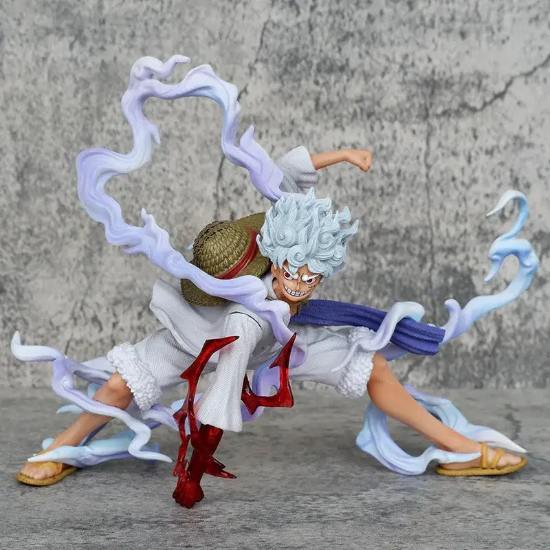 Figurine one piece luffy gear 5 en blanc et bleu avec cheveux argentés, chapeau de paille et effets d’énergie dynamiques