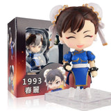 Figurine pop chun-li style chibi en plastique habillée en uniforme bleu et rouge avec bordures dorées street fighter