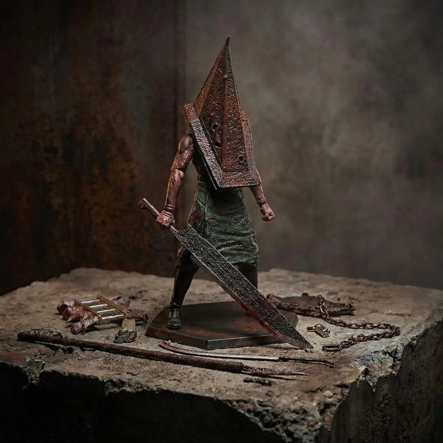 Red Pyramid Head Figurine