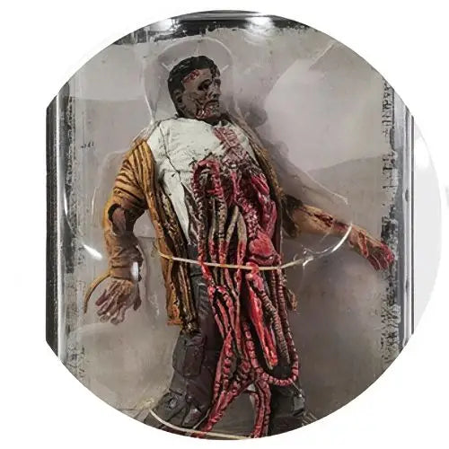 Détaillée figurine walking dead d un zombie grotesque couleur chair avec organes internes exposés et tentacules rouges