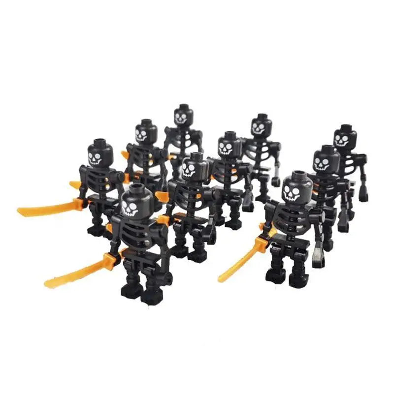 Figurines lego squelette ninja pirates en plastique noir avec têtes de crâne blanches et épées orange