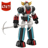 Détails d’une figurine robot mini block goldorak de 476 pièces en blanc noir avec accents rouges et teal pour créations moc exclusives