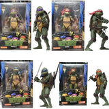 Figurines tortues ninja en plastique vert détaillées avec bandanas colorés et armes caractéristiques des personnages