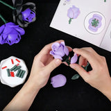 Assemble-it-yourself brick flowers, pink and purple