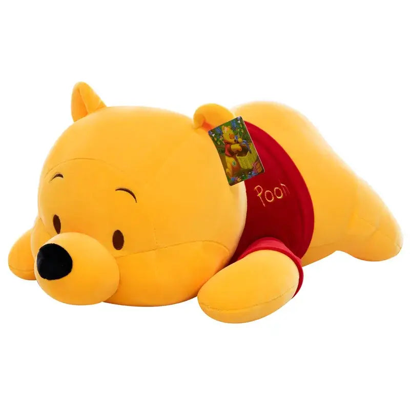 Grande peluche winnie l’ourson avec corps jaune doux nez noir et t-shirt rouge brodé peluche winnie l’ourson