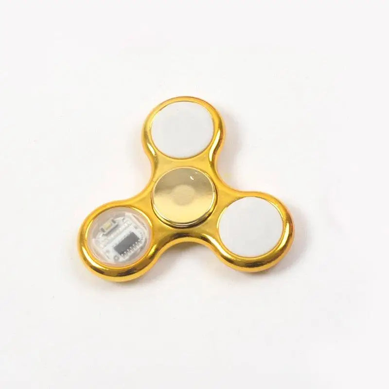 Hand spinner lumineux doré trois branches avec section transparente révélant circuit électronique pour enfants lumières led