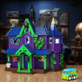 Jeu de construction maison hantée scooby-doo avec château hanté violet et vert et camionnette mystery bleue