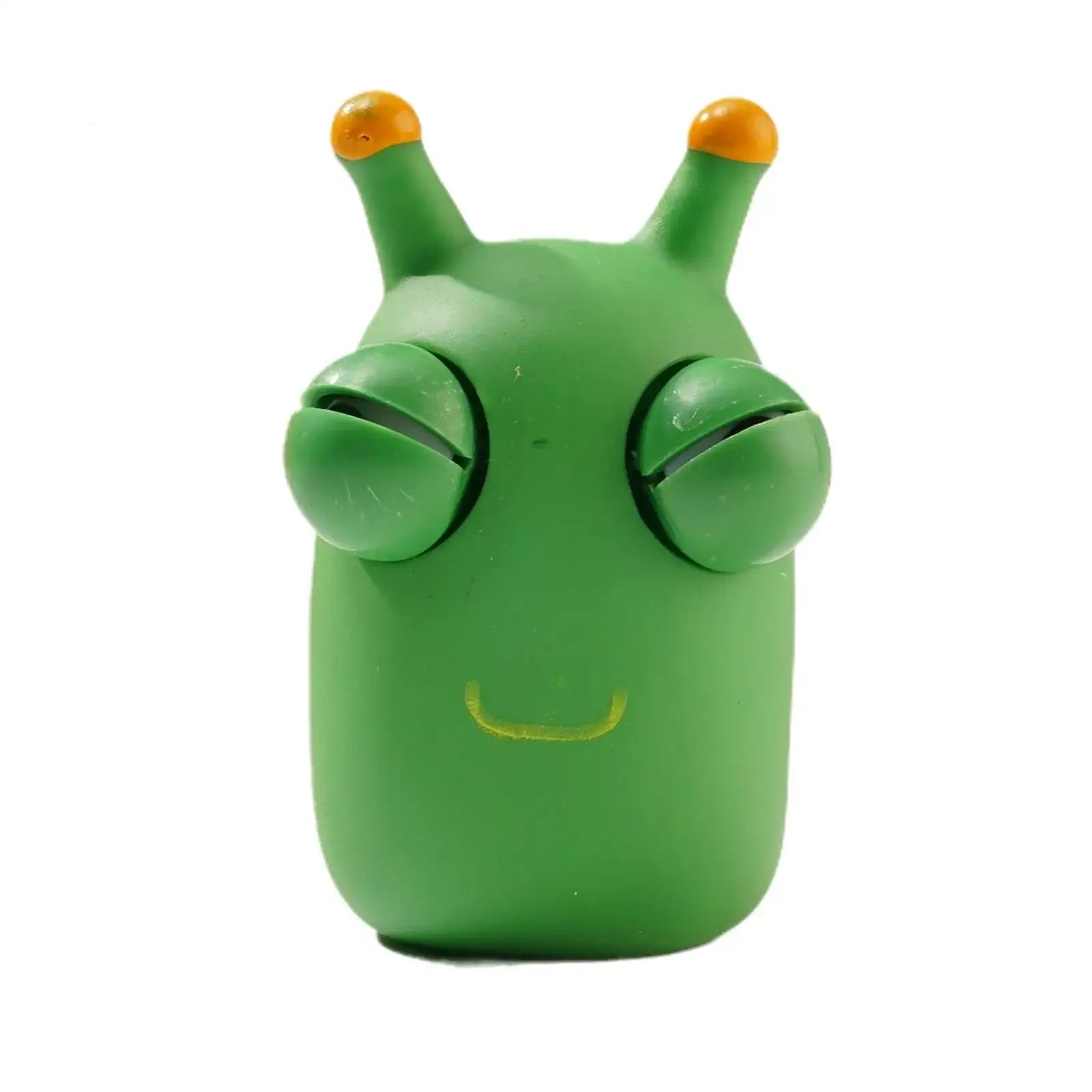 Jouet à presser balles oculaires amusantes en plastique vert avec antennes orange et sourire jaune pour expérience sensorielle unique