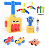 Jouet avec ballons de baudruche pompe électrique jaune et bleue avec visage cartoon, bouton rouge et accessoires colorés