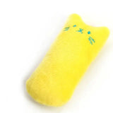Jouet peluche à mordre pour chat en tissu jaune vif avec visage brodé bleu teal pour jouets à mâcher
