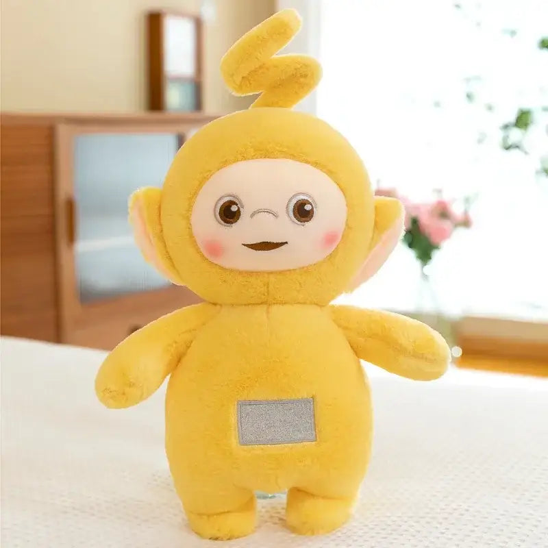 Peluche doudou teletubbies jaune douce avec patch argenté rectangulaire sur le ventre peluche teletubbies préférée